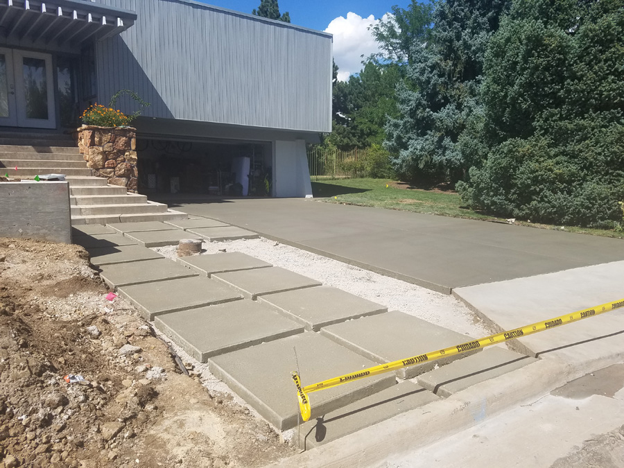 Concrete driveway and front entry from the Sunny Day Concrete project gallery