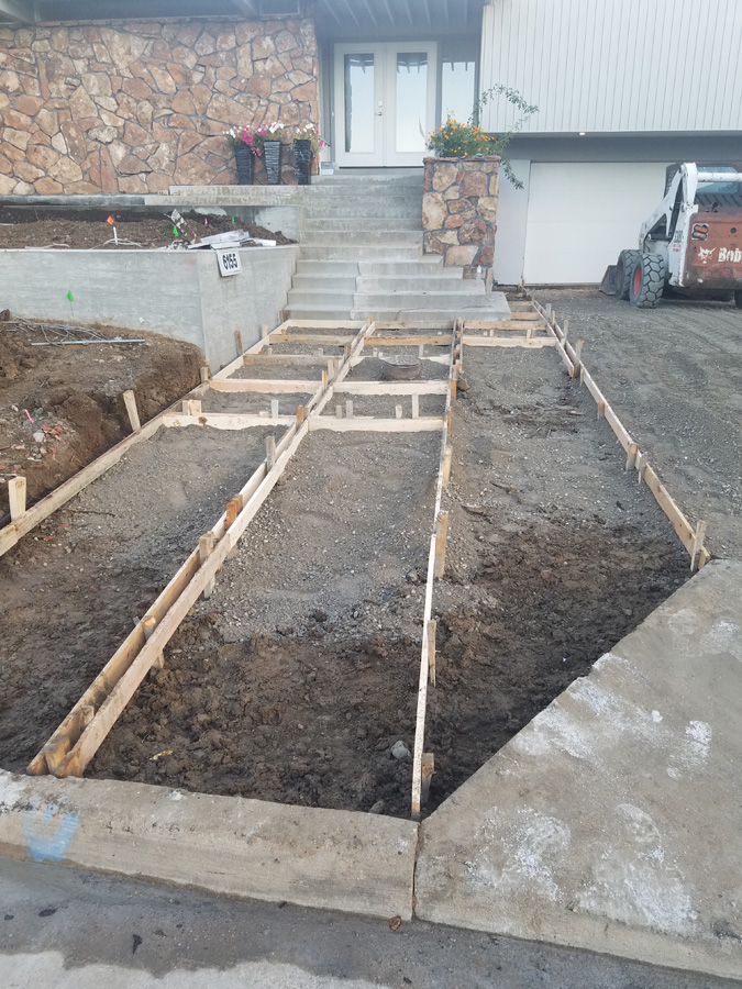 Prepared base and formwork for a residential walkway and entry